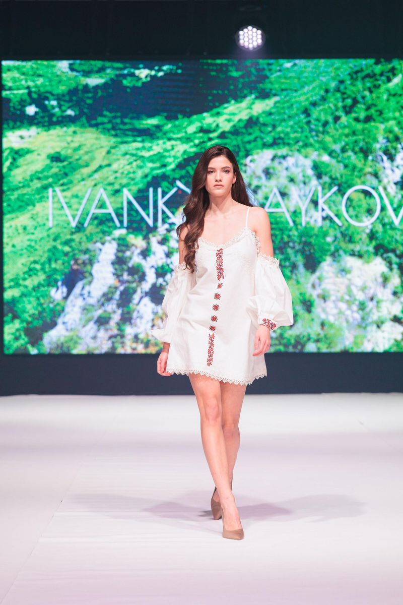 White linen dress with elegant embroidery